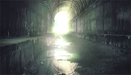 An inside view of the waterfilled tunnel No 1 on the Udhampur-Katra track, which will have to be redesigned for laying the railway line. 