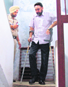 Tehsildar GS Benipal comes out of his office in Ludhiana on MAonday. 