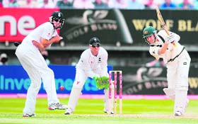 Australias Michael Clarke plays a shot on the fifth day of the third Test at Edgbaston