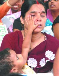 Mothers of missing kids protest against the Delhi police at the police headquarters in New Delhi
