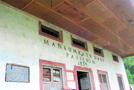 The renovated Pavilion Ground building with broken windows and a leaking roof.
