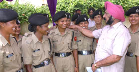Lieut-Col Manmohan Singh (retd) bless the girls, who got selected as BSF constables, in Jalandhar.