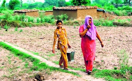 Residents of Suchetgarh fetch water from a far-off village in Samba.