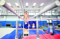 A young gymnast trains at the Beijings Shichahai sports school. 