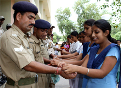 Students of Dashmesh School tying rakhis to ITBP personnel in Bathinda on Wednesday. 