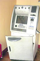 The damaged ATM of Punjab National Bank branch at Bassi Pathana.