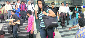 Auto-rickshaw and taxi drivers harass women coming out of the railway station in Chandigarh.