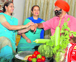 Comedian Jaspal Bhatti gives costly groceries to his sisters on the occasion of Raksha Bandhan in Chandigarh on Wednesday.