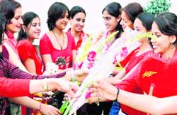 Students welcome freshers with flowers on Friendship Day