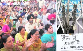 Bank employees stage a protest in support of their demands at Sector 17 in Chandigarh