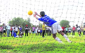 A player in action during a match between GTB School, Dakha, and KVM School in the Inter-Zonal Football Tournament Held at PAU in Ludhiana