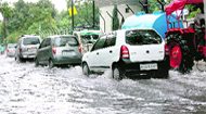 Water accumulated at Rajpur Road in Dehradun on Friday.