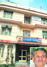 A police team inspects the office of the Jammu Chambers of Commerce and Industry where its president Ram Sahai (inset) was found dead on August 5.
