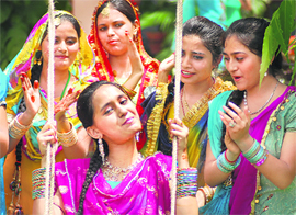 Students celebrating Teej in Ludhiana.