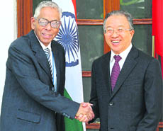 National Security Adviser MK Narayanan with China representative Dai Bingguo in New Delhi on Friday.