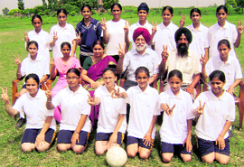 Winners pose with director and principal of Anand Isher Senior Secondary School near Ahmedgarh on Friday.