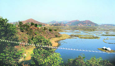 The serenity of the Loktak lake attracts dancing deer called Sangai