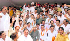 Congress leaders protest at the Gandhi Park in Dehradun on Sunday.