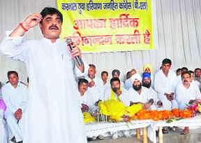 Rakesh Kamboj, HJC state youth wing president, addresses a party workers meeting in Karnal on Sunday.