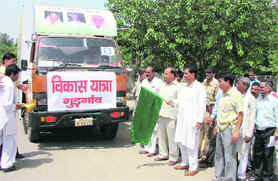 Bhupinder Chaudhary, MLA, Pataudi, flags off the vikas yatra at the mini-secretariat in Gurgaon on Sunday. 