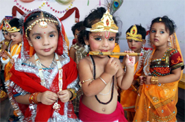 Tiny-tots of Kids Care Playway school dressed up as Radha and Krishna ahead of Janamashtami in Bathinda on Monday.