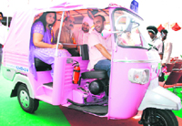STA Secretary Vandana Disodia and Additional Secretary Anil Sharma enjoy a ride of Tuk-tuk in Chandigarh on Monday.