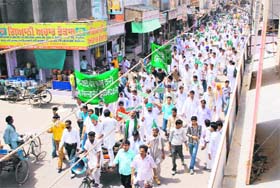 INLD workers stage a demonstration in Dabwali town in Sirsa against rising prices and power and water shortage