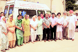 Relatives of Brig Zora Singh and Dr Gurjit Singh donate an ambulance in their memory at Brahampur village, near Ahmedgarh.