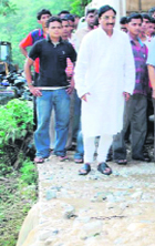 CM Ramesh Pokhriyal on a visit to the site of the cloudburst.