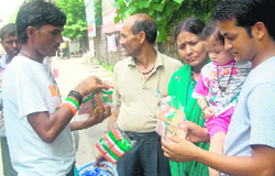 A hawker sells flags on the streets of Dehradun on Tuesday.