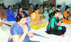 Women participate in a yoga camp organised by the Vivekananda Kendra in Kangra.