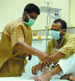 Sukhwinder Singh, a suspected swine flu patient, undergoes treatment at Civil Hospital in Jalandhar.