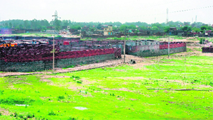 Illegal structures on a riverbed on the outskirts of Jammu.