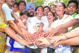 On the eve of International Youth Day, volunteers of Yes!+ Chandigarh take a pledge at the Sector 17 plaza.
