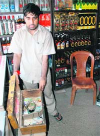The liquor vend at Mansa Devi Complex from where robbers took away around Rs 25,000 at gunpoint in Panchkula