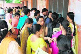 Students line up to submit fees for the new academic session in Haridwar