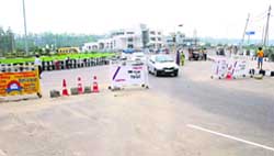 A view of an entry point to Rohtak near the university bypass where a police checkpoint has been set up but no cop is present
