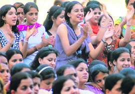 Students cheer during Teej celebrations at Khalsa College for Women, Ludhiana,on Wednesday.