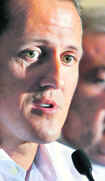 Former world champion Michael Schumacher during a press conference in Geneva on Wednesday. Schumacher has called off plans to return to formula one racing at the European Grand Prix in Valencia due to a neck injury.  AFP