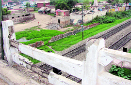 A broken railing of the overbridge on the Ambala-Hisar road.