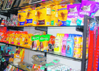 Variety of products for dogs on display at a shop in Dehradun.