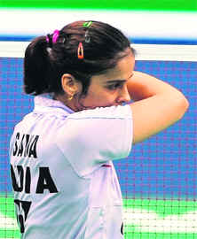 Saina Nehwal reacts after losing her match against Wang Lin of China in Hyderabad on Friday.