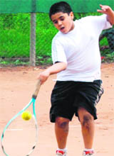 A player in action during the LD Kapoor Memorial Total Tennis Championship in Chandigarh.