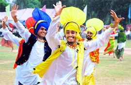Students perform during the Independence Day celebrations in Ludhiana on Saturday.