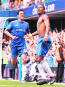 Didier Drogba (R) and M ichael Ballack celebrate Chelseas second goal on Saturday