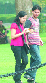 A couple enjoys the weather in New Delhi on Sunday.