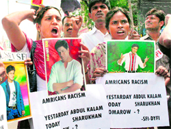 Students Federation of India activists protest against ignominy to Shah Rukh Khan due to his detention at the Newark Airport, in Musheerabad, Hyderabad, on Sunday.