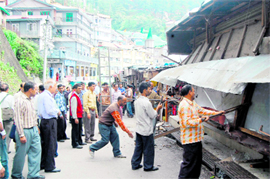 An anti-encroachment drive by the municipal corporation of Shimla at the Mall road on Monday.