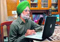 Jarnail Singh surfs for government schemes.
