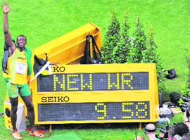 Usain Bolt celebrates after winning the mens 100m final race of the 2009 IAAF Athletics World Championships on Sunday.